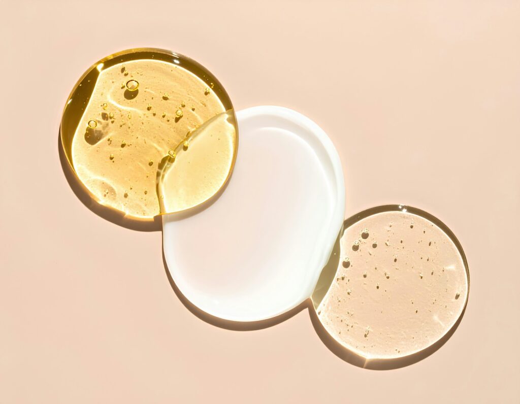 Different serums or lotions are arranged artfully.